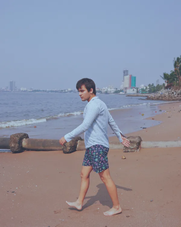 Man in Whats Down Blue Nautical printed boxers at the beach. Photo 1