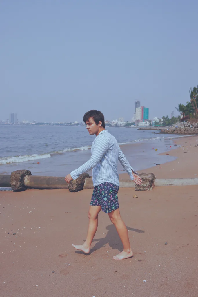 Man in Whats Down Blue Nautical printed boxers at the beach. Photo 1