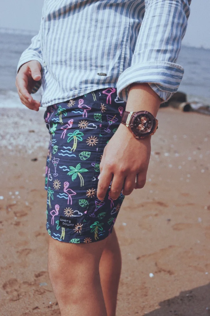 Man in Whats Down Blue Nautical printed boxers at the beach. Photo 5