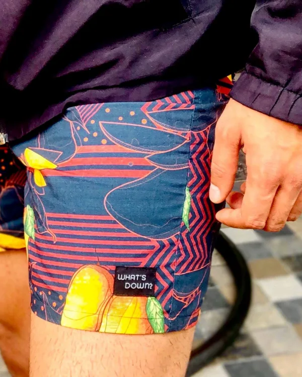 Man in Whats Down Orange Mango printed boxers in the snow. Photo 2