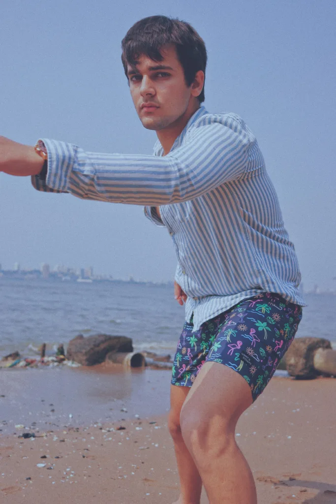 Man in Whats Down Blue Nautical printed boxers at the beach. Photo 6