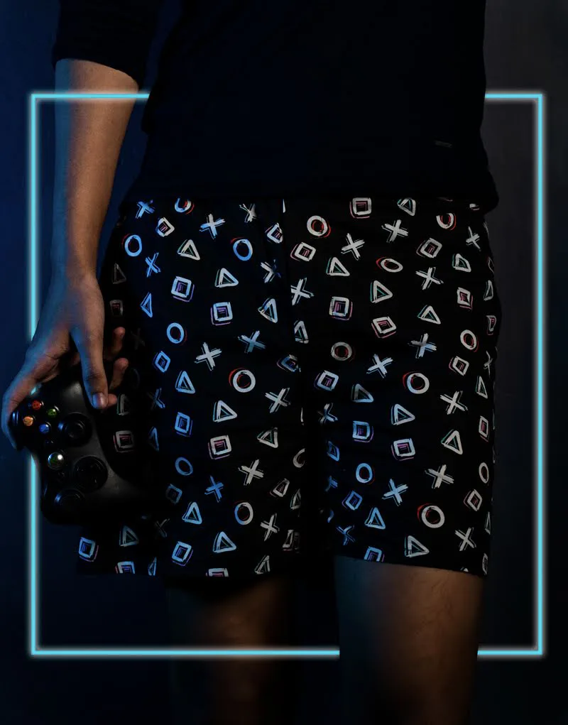 Man in Whats Down Black Playstation printed boxers. Photo 1