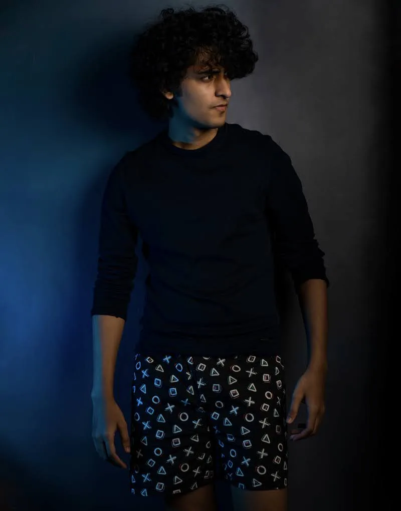 Man in Whats Down Black Playstation printed boxers. Photo 3