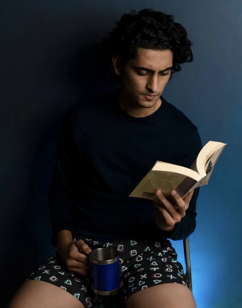 Man in Whats Down Black Playstation printed boxers. Photo 4
