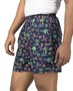 Whats Down navy flamingo printed men's boxers on a model, studio. Front