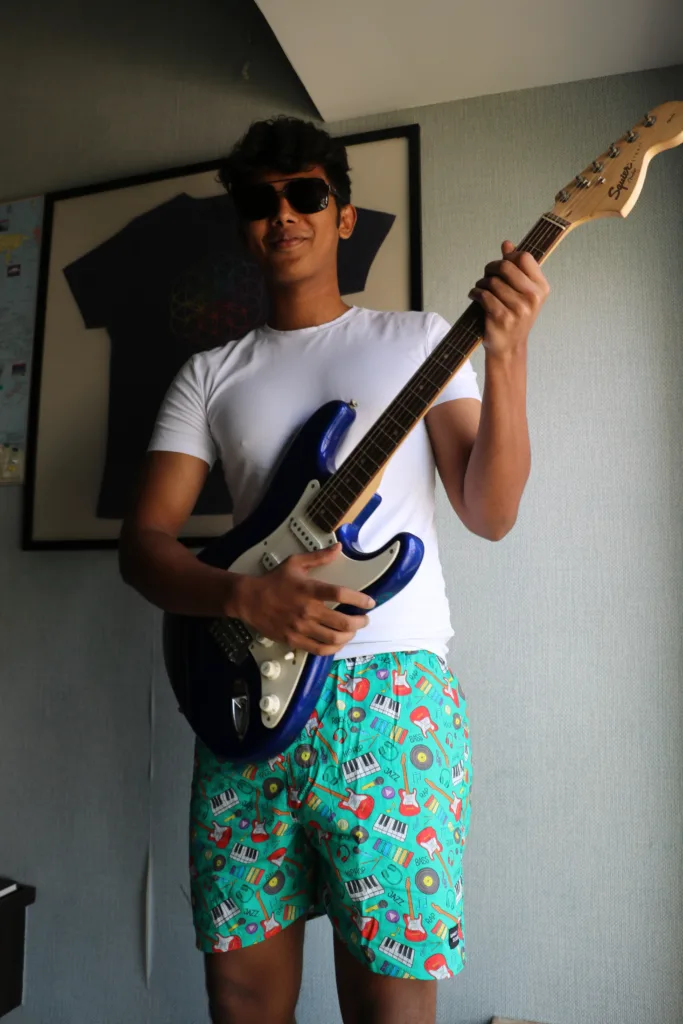 Man with a guitar in Whats Down Green Musical printed boxers. Photo 3