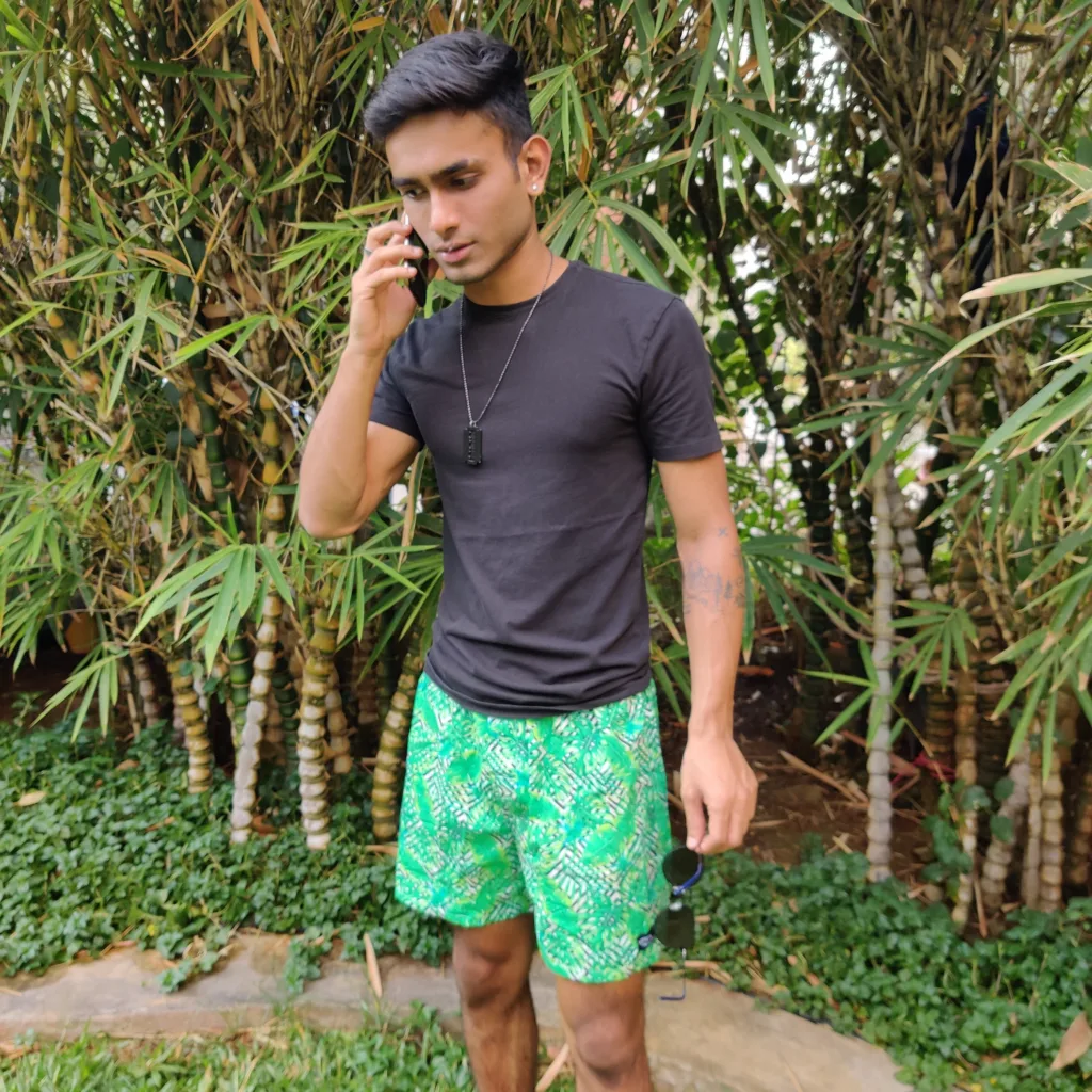 Man in Whats Down Green Tropical printed boxers. Photo 2