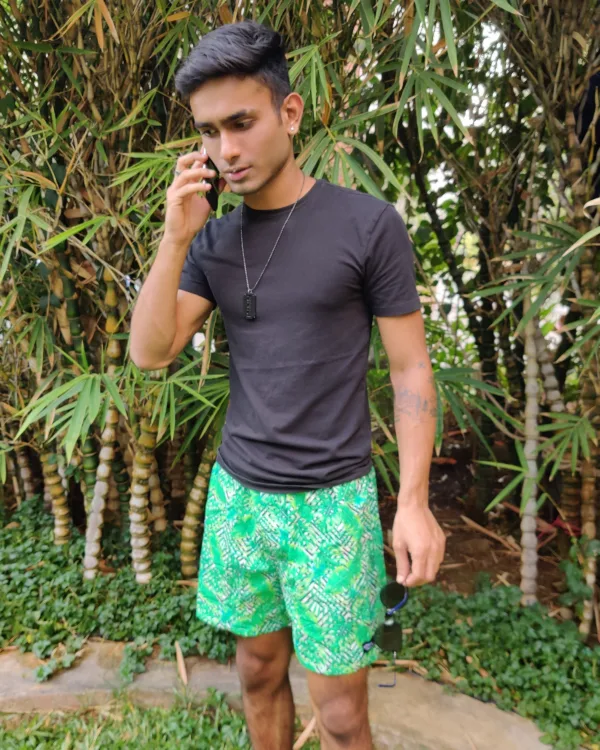 Man in Whats Down Green Tropical printed boxers. Photo 2