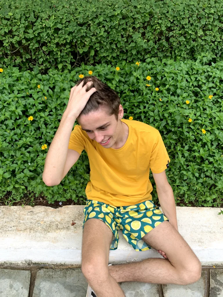 Man in a yellow tee and Whats Down Green Lemon printed boxers. Photo 2