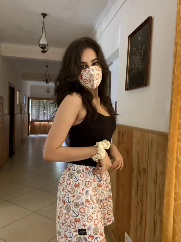 Woman in a Whats Down printed face mask and White Nautical printed boxers. Photo 2
