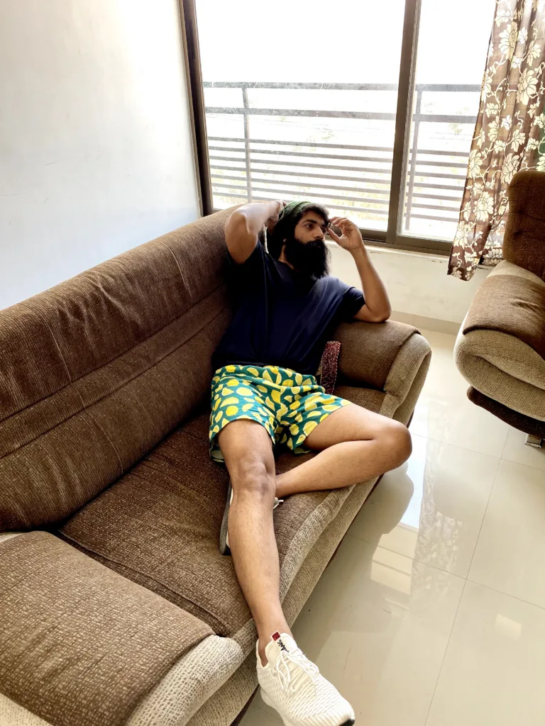 Man in a yellow tee and Whats Down Green Lemon printed boxers. Photo 5