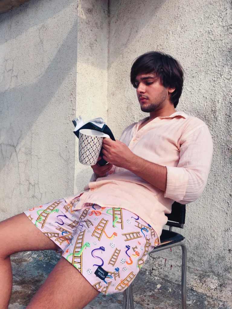 Man in Whats Down Pink Snakes & Lads printed boxers. Photo 4
