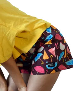 Whats Down Maroon Umbrella women's printed cotton boxers on a model in a yellow tee. Side detail