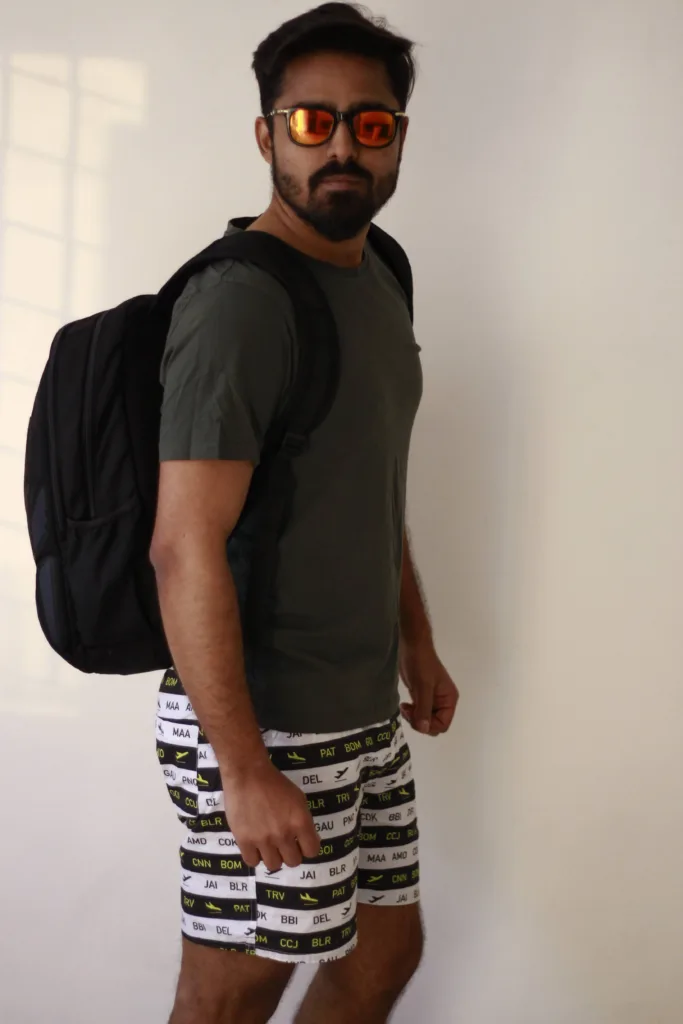 Man in Whats Down Motivational Quotes black-and-white printed boxers. Photo 1