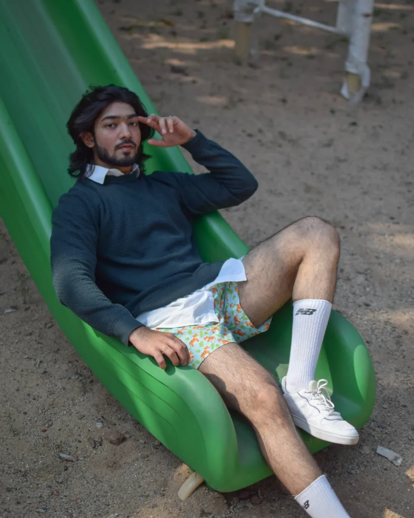 Man in Whats Down Green Sher Khan printed boxers at the playground. Photo 1