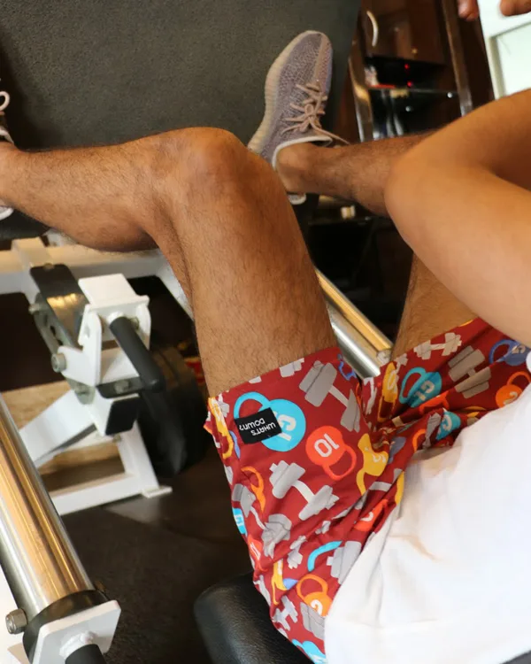 Man at the gym in Whats Down Maroon Dumbbells printed boxers. Photo 8