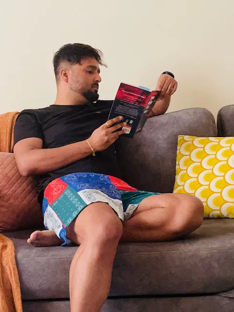 Man in Whats Down Multicolour Scarf patchwork printed boxers. Photo 3